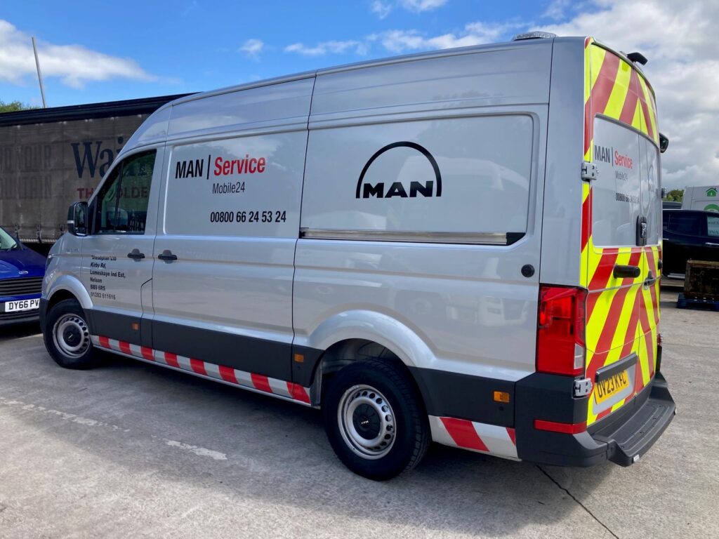 MAN Service mobile workshop van with chevron markings