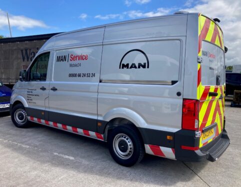 MAN Service mobile workshop van with chevron markings