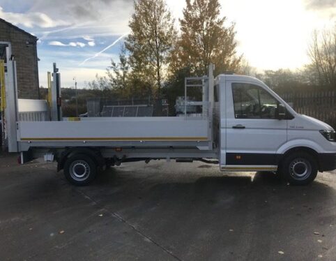 MAN TGE dropside flatbed conversion, side view