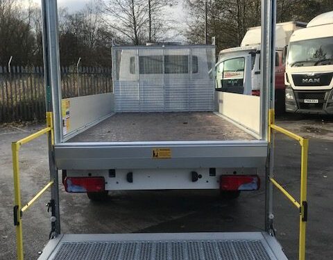 MAN TGE tipper body conversion with dropside panels