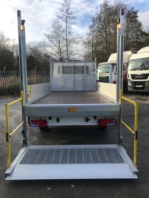 MAN TGE tipper body conversion with dropside panels