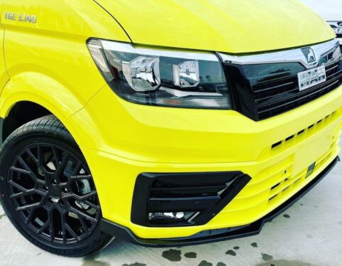 MAN TGE van finished in high-visibility yellow, front view
