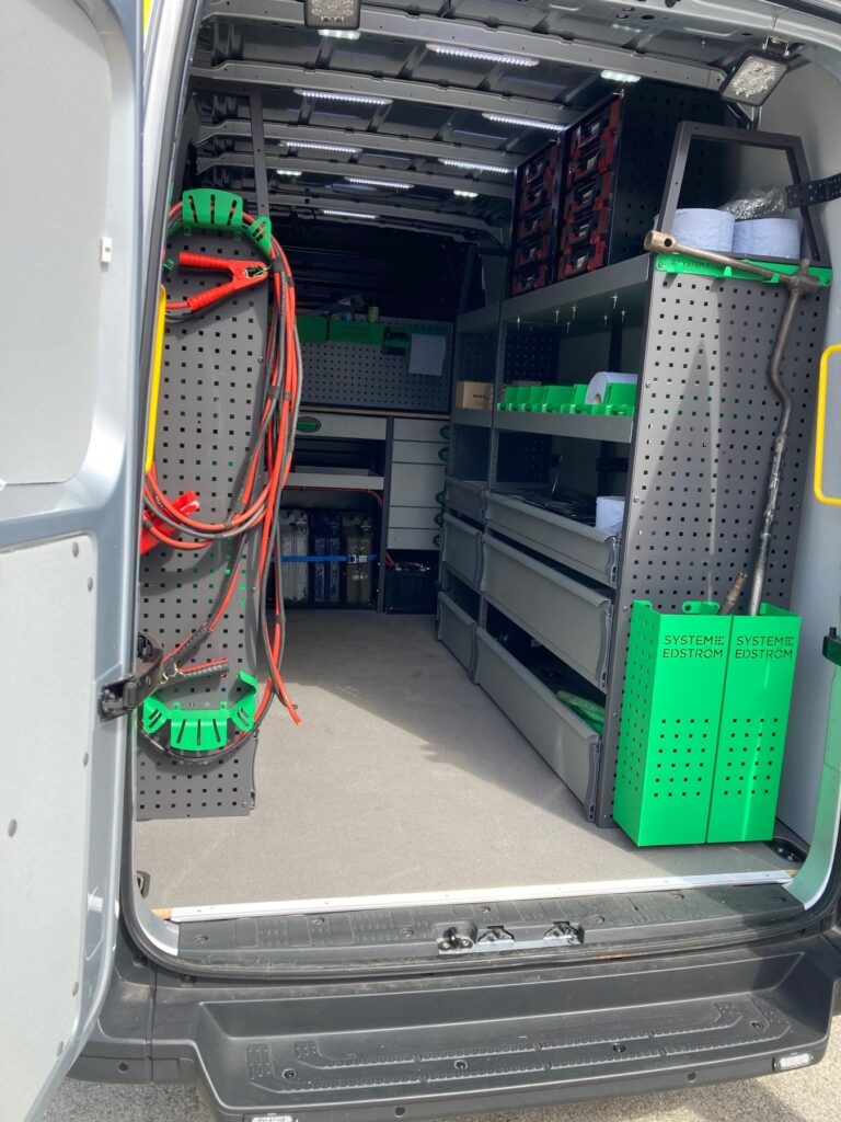 Mobile workshop van conversion with racking and power supply