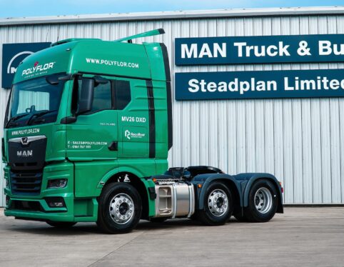 Green MAN TGX tractor unit supplied by Steadplan to Polyflor, outside MAN Truck and Bus Steadplan Limited