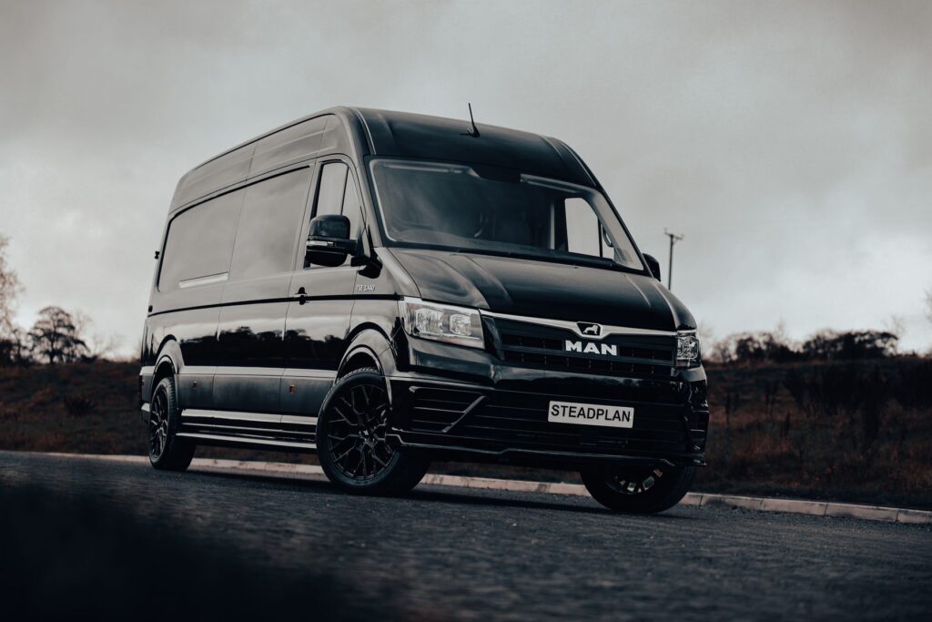 Black MAN TGE panel van supplied by Steadplan