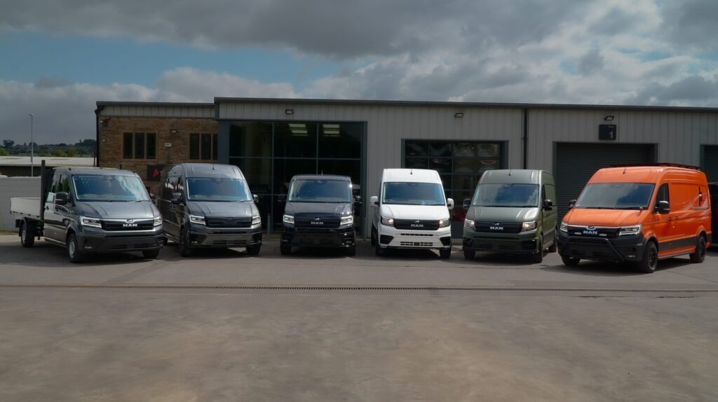 Line-up of vans with aftermarket wheels and extras fitted by Steadplan