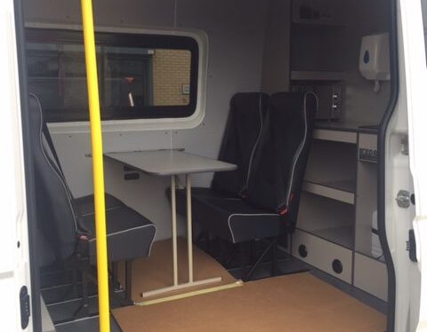 Welfare van conversion interior with seating and storage
